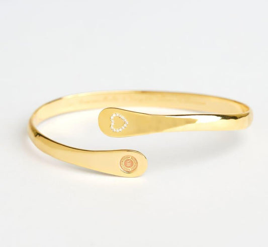 Gold engraved mother-daughter bracelet set with heart-shaped stone detail and round emblem