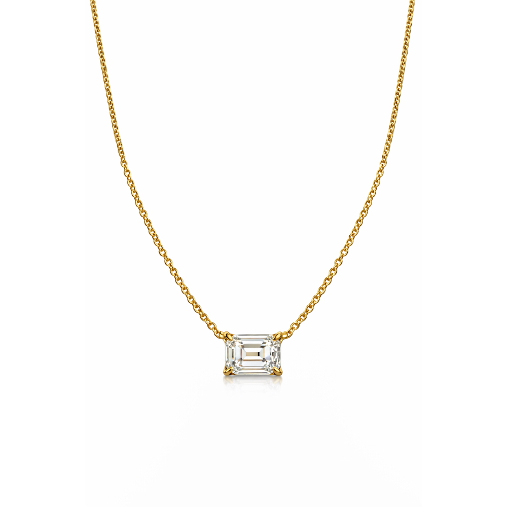 Gold-tone chain necklace with emerald-cut clear stone pendant