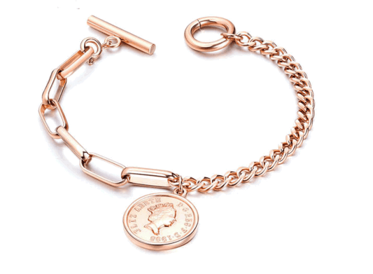 Rose gold link bracelet with coin charm and toggle clasp