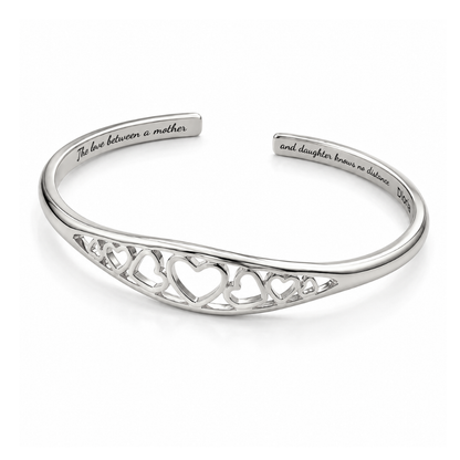 Silver-tone heart cutout adjustable cuff bracelet with inner mother-daughter quote
