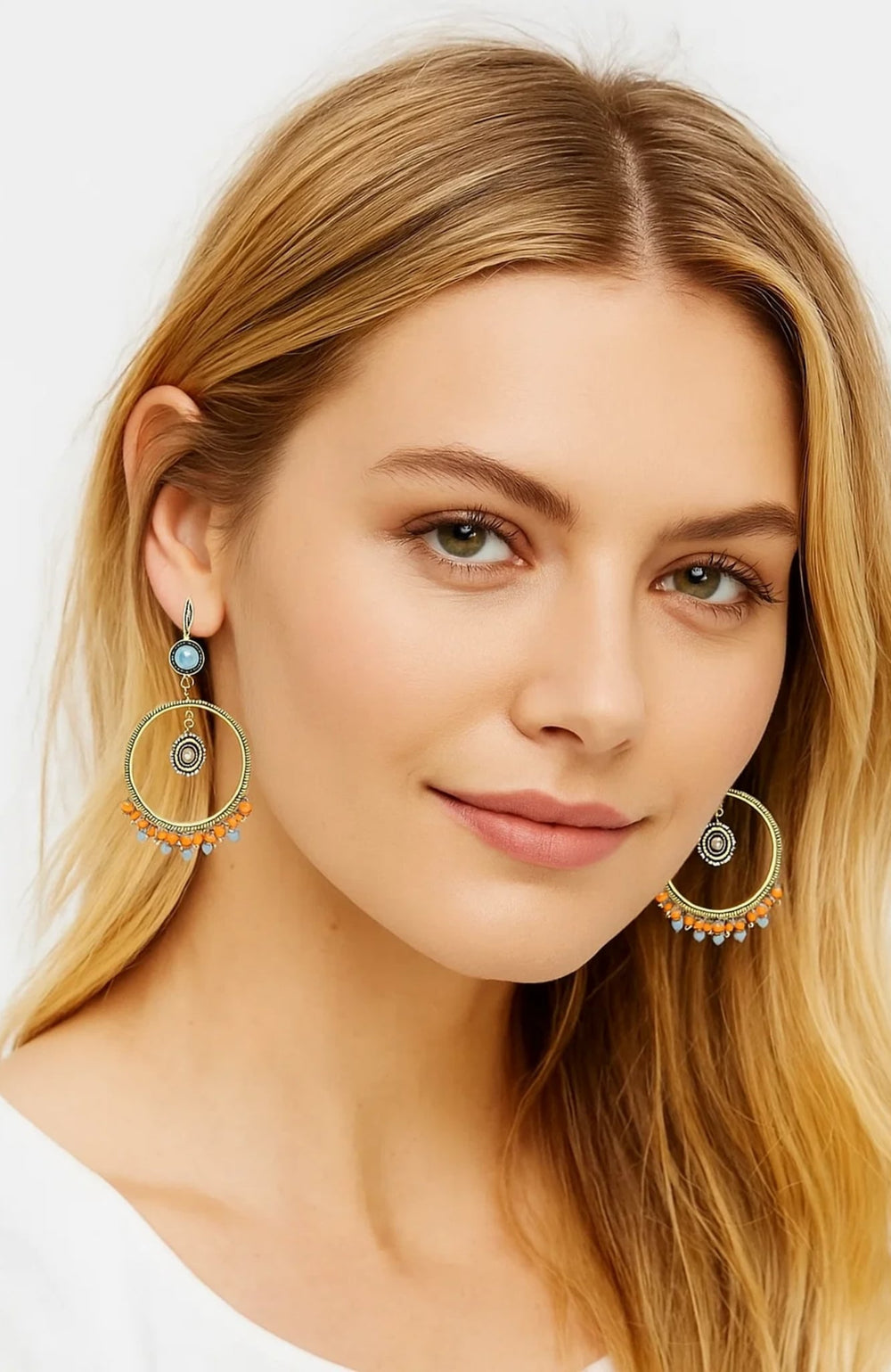 Gold boho hoop earrings with turquoise cabochon and beaded circular center, dangle pair