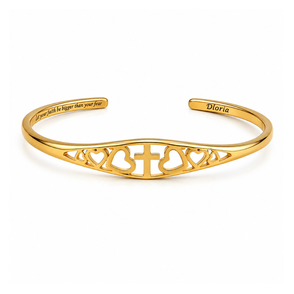 Gold faith bracelet with cross and heart cutout engraving, adjustable cuff bangle
