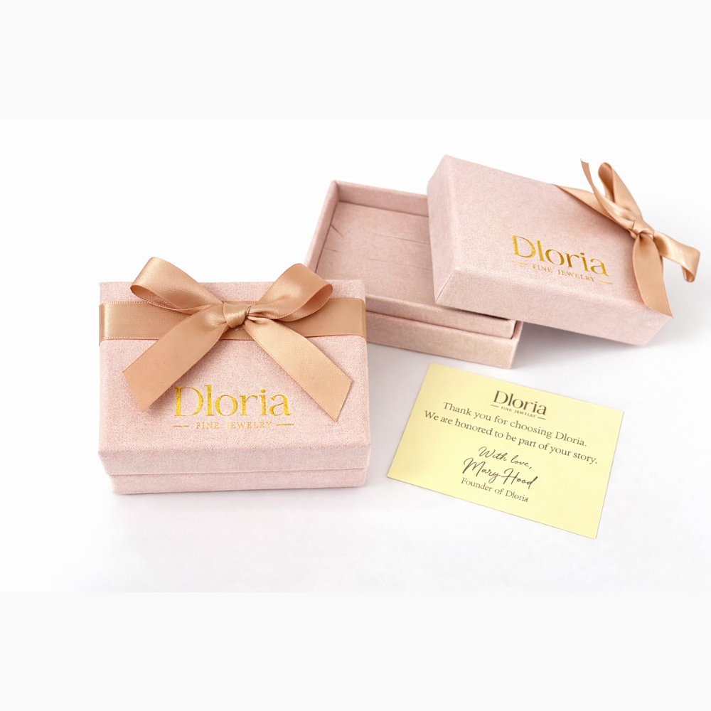 Dioria gift box and thank-you card with pear-shaped gemstone ring
