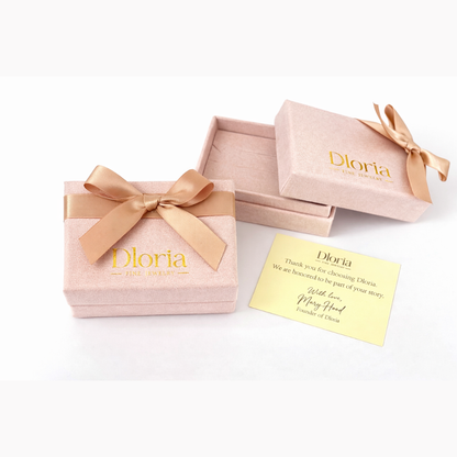 Dioria gift box and thank-you card with pear-shaped gemstone ring