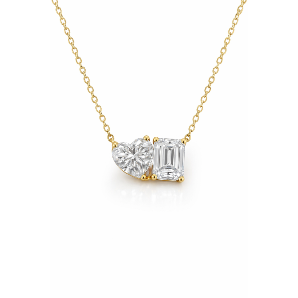Gold vermeil necklace with a heart moissanite and an emerald-cut moissanite in a two-prong setting
