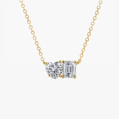 Gold vermeil two-stone necklace with heart-shaped and emerald-cut moissanite settings on chain