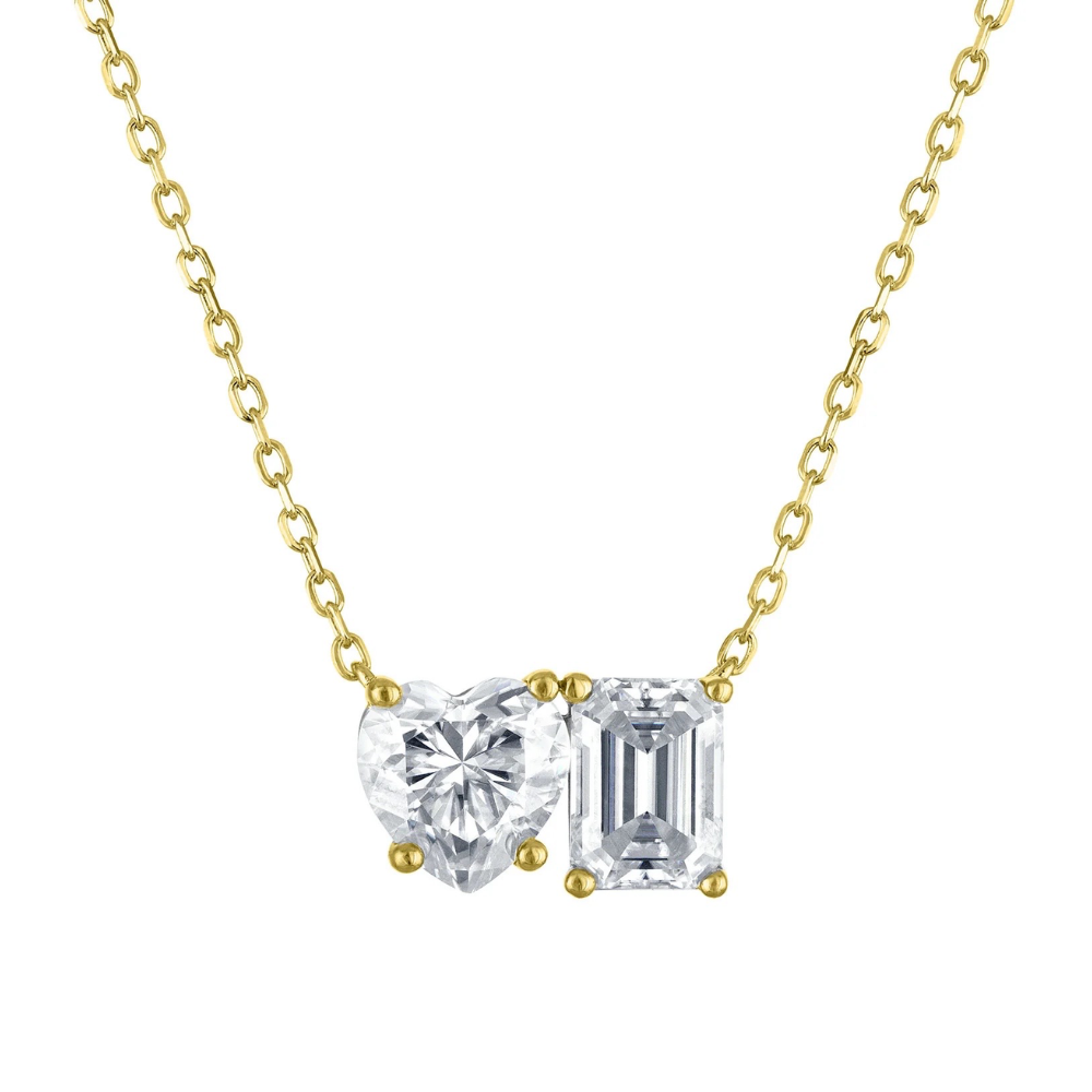 Gold vermeil necklace featuring a heart and emerald-cut moissanite pendant with gold prongs