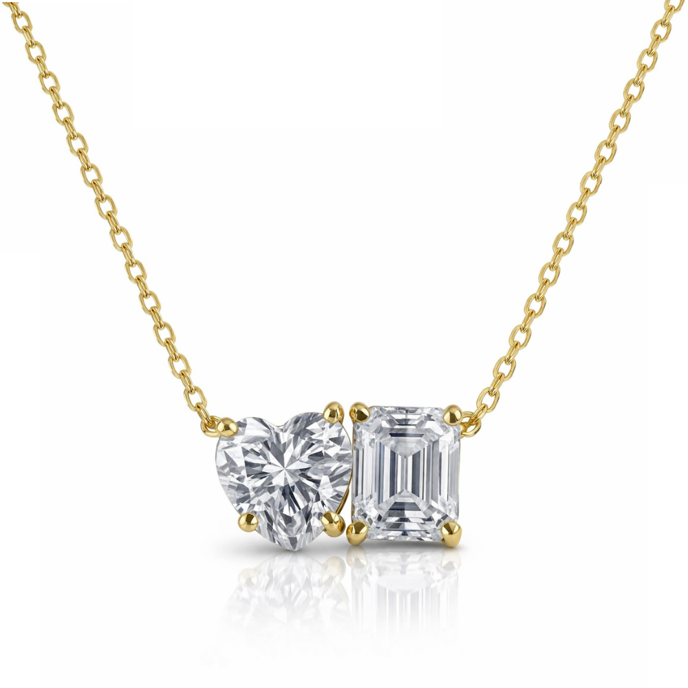 Gold vermeil necklace with heart and emerald-cut moissanite stones on a fine chain