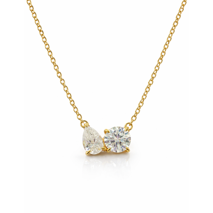 Gold vermeil toi et moi necklace with pear and round-cut clear stones, curb chain