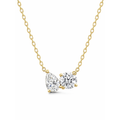 Gold vermeil necklace with pear- and round-cut clear stones on a curb chain