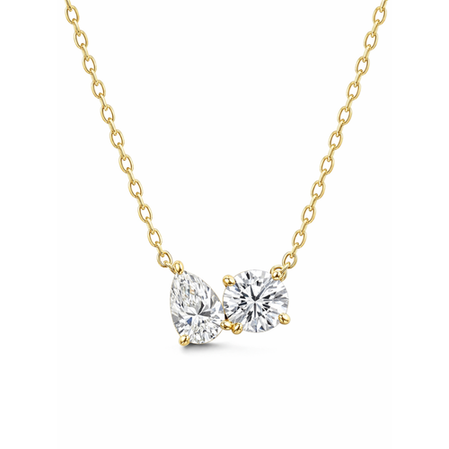 Gold vermeil necklace with pear- and round-cut clear stones on a curb chain