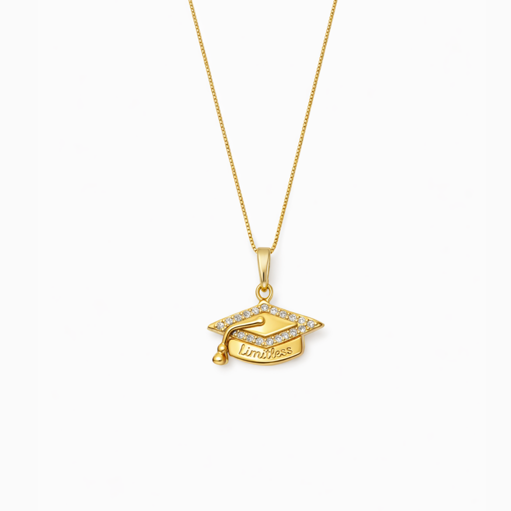 Gold necklace with a graduation cap pendant on a white background