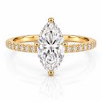Marquise pavé solitaire ring with gold band and large clear center stone