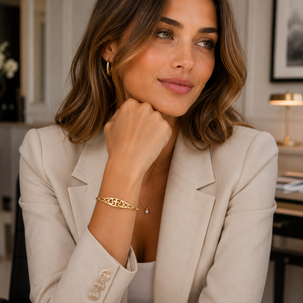 Gold faith cuff bracelet with heart and cross cutout engraving