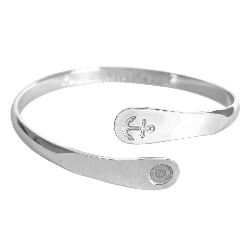 Silver anchor engraved cuff bracelet with oval charm plate and curved band