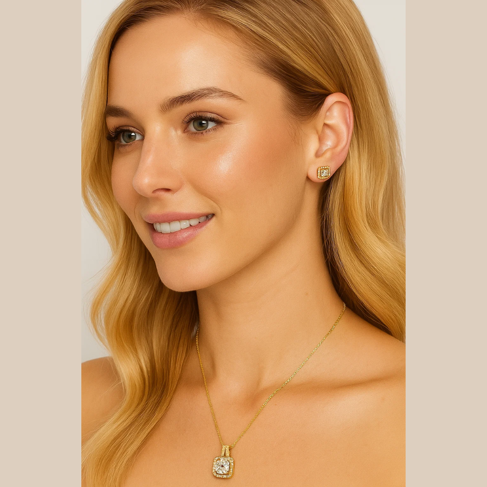 Gold halo pendant necklace and stud earrings with round clear gemstones