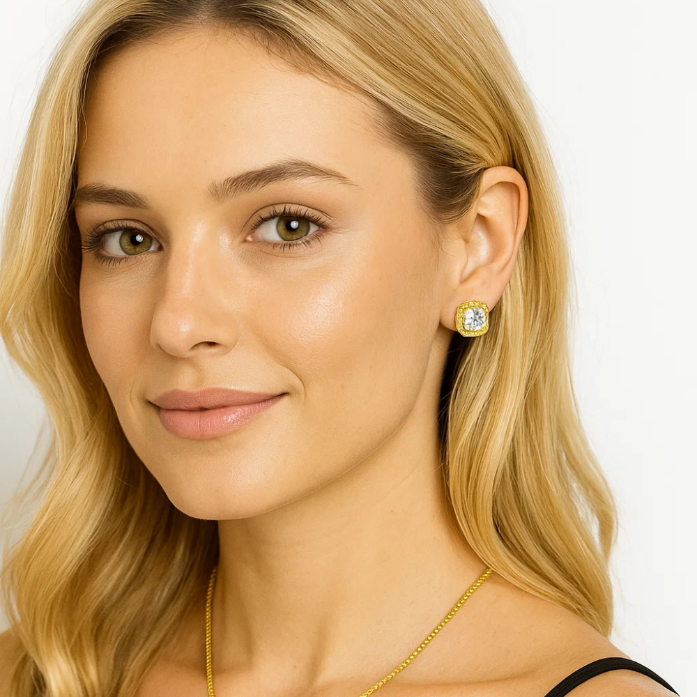 Gold halo stud earrings and fine chain pendant with round clear gemstone