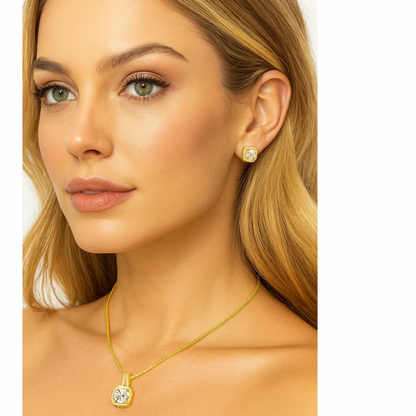 Gold halo stud earrings and matching pendant necklace with round clear gemstone