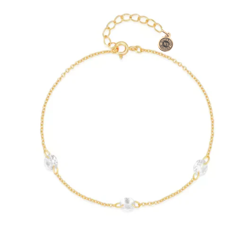 Gold-tone bracelet with clear oval cubic zirconia charms and round link chain