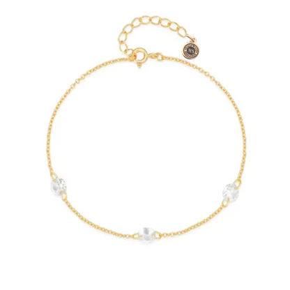 Gold-tone bracelet with clear oval cubic zirconia charms and round link chain