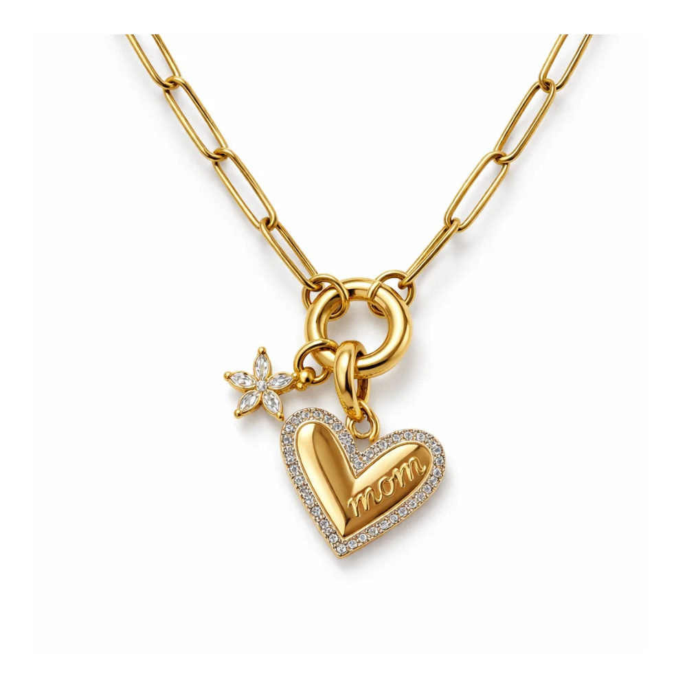 Gold heart charm necklace with flower detail, glitter border, and MOM text pendant
