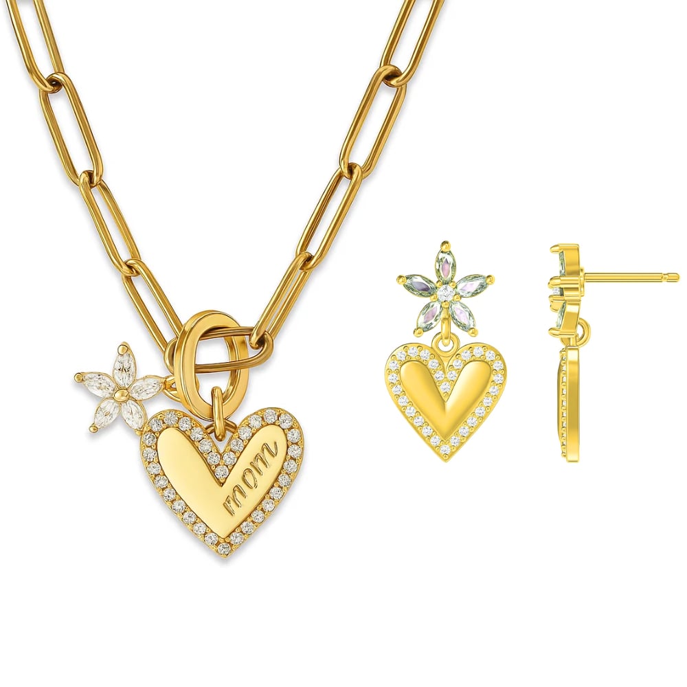Gold heart pendant necklace with flower accents and matching crystal earrings