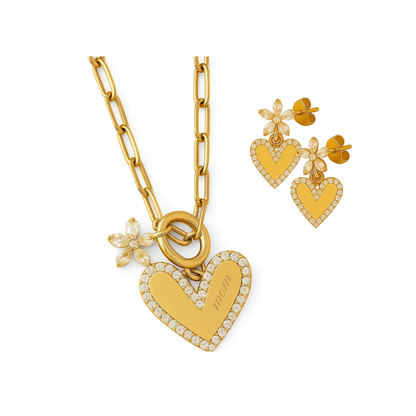 Gold heart pendant necklace with flower charm and two heart stud earrings