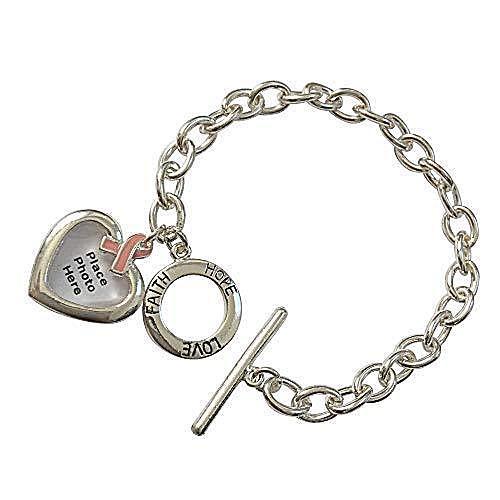 Silver link bracelet with heart locket, cross charm, and circular faith charm