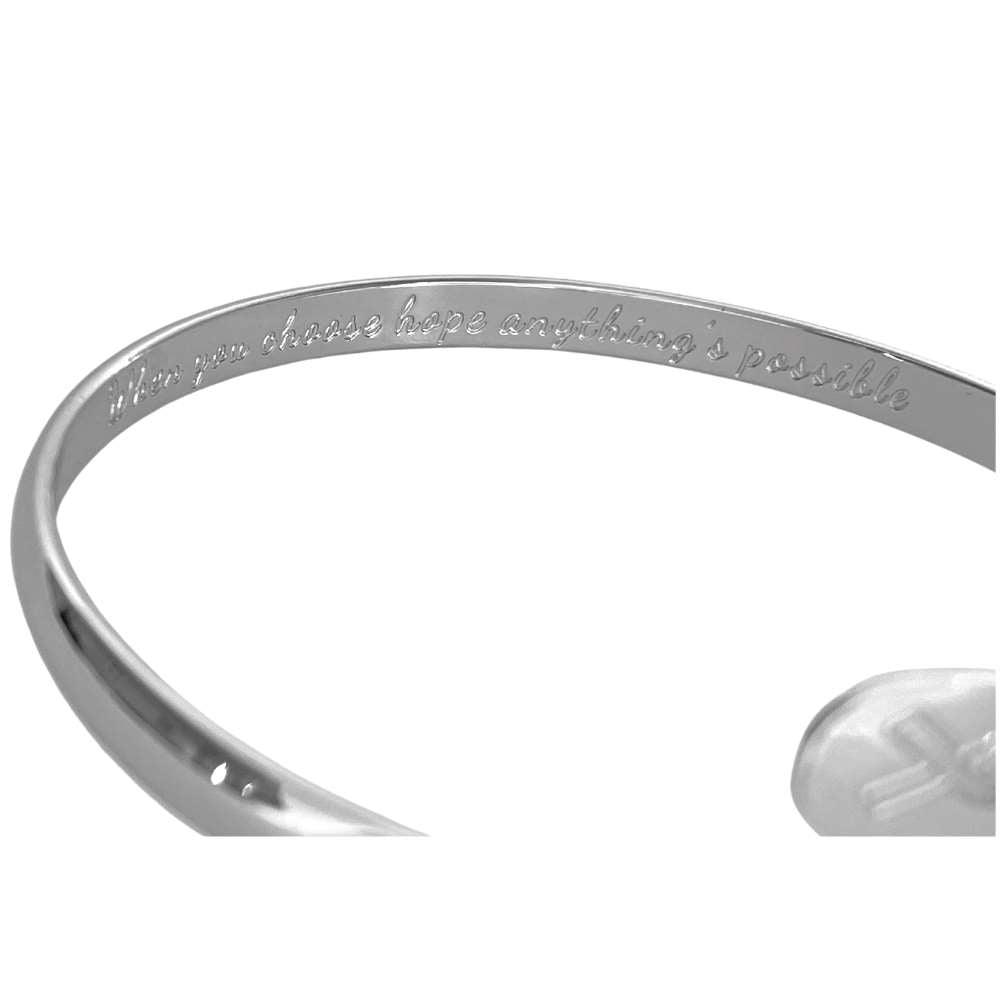 Silver engraved metal bracelet with hope message along the cuff