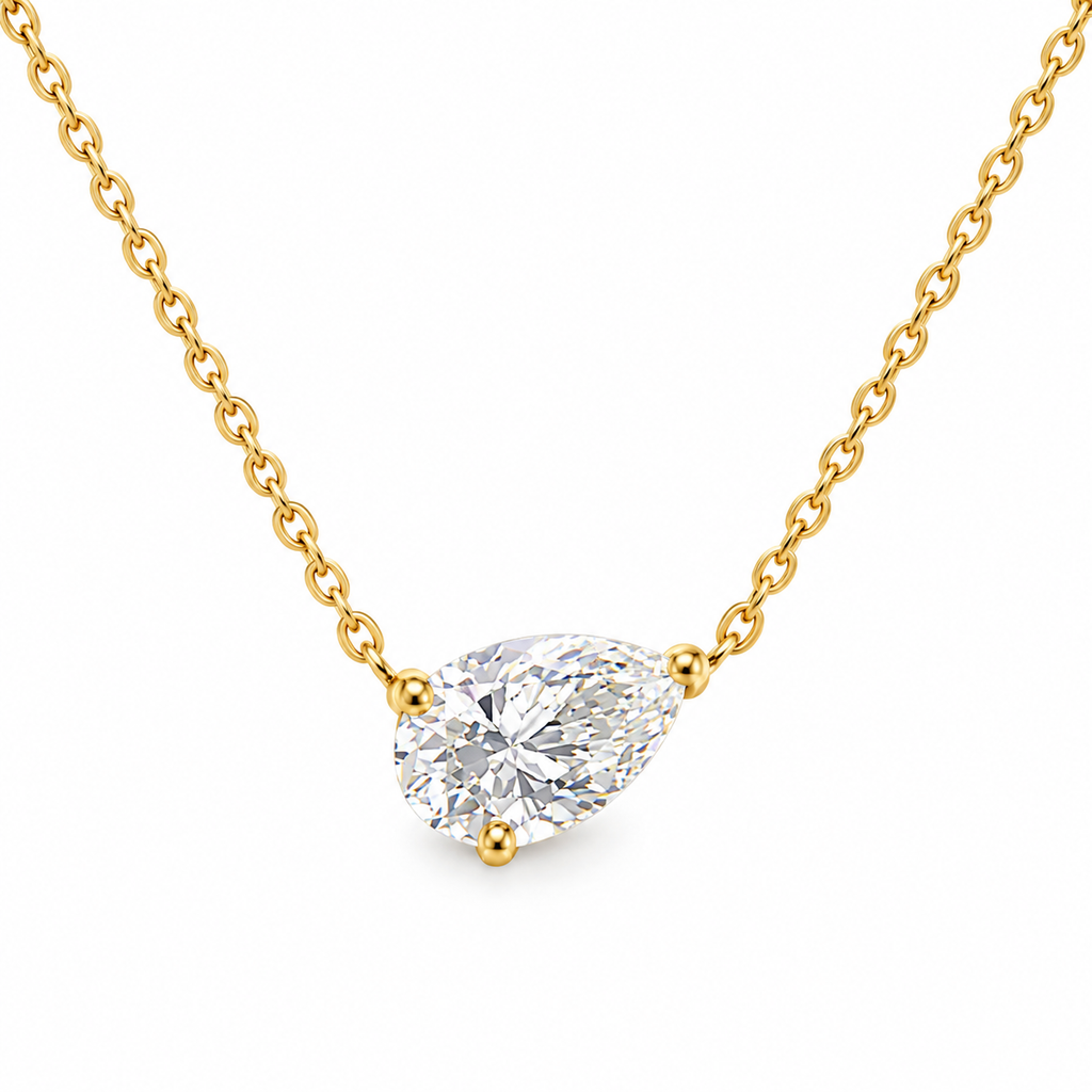 Gold chain pear-shaped solitaire pendant necklace with clear round-cut stone