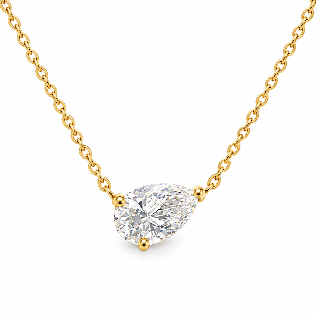 Gold chain pear-shaped solitaire pendant necklace with clear round-cut stone