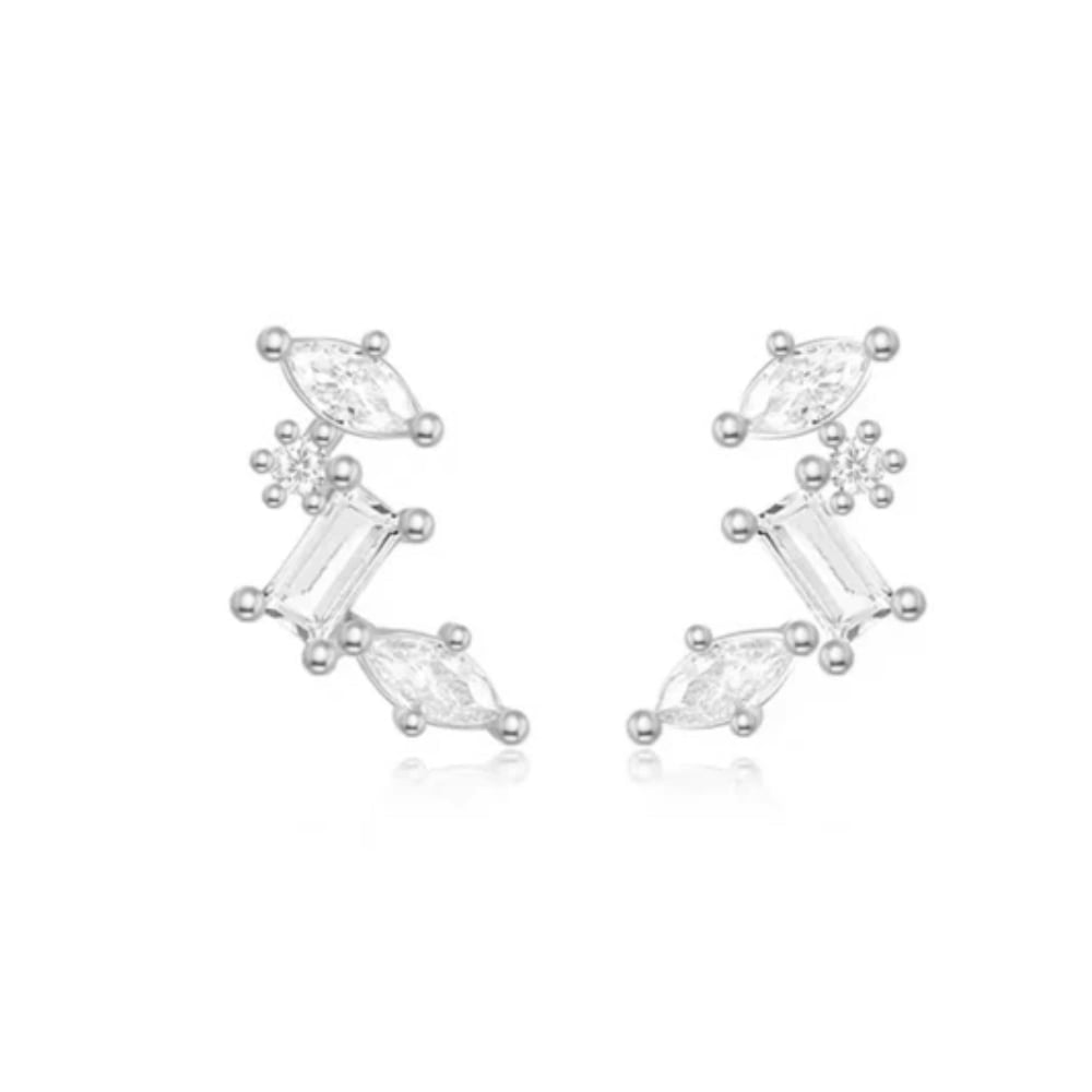 Silver-tone celestial cluster earrings with oval, baguette, and round CZ stones