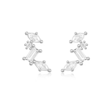 Silver-tone celestial cluster earrings with oval, baguette, and round CZ stones