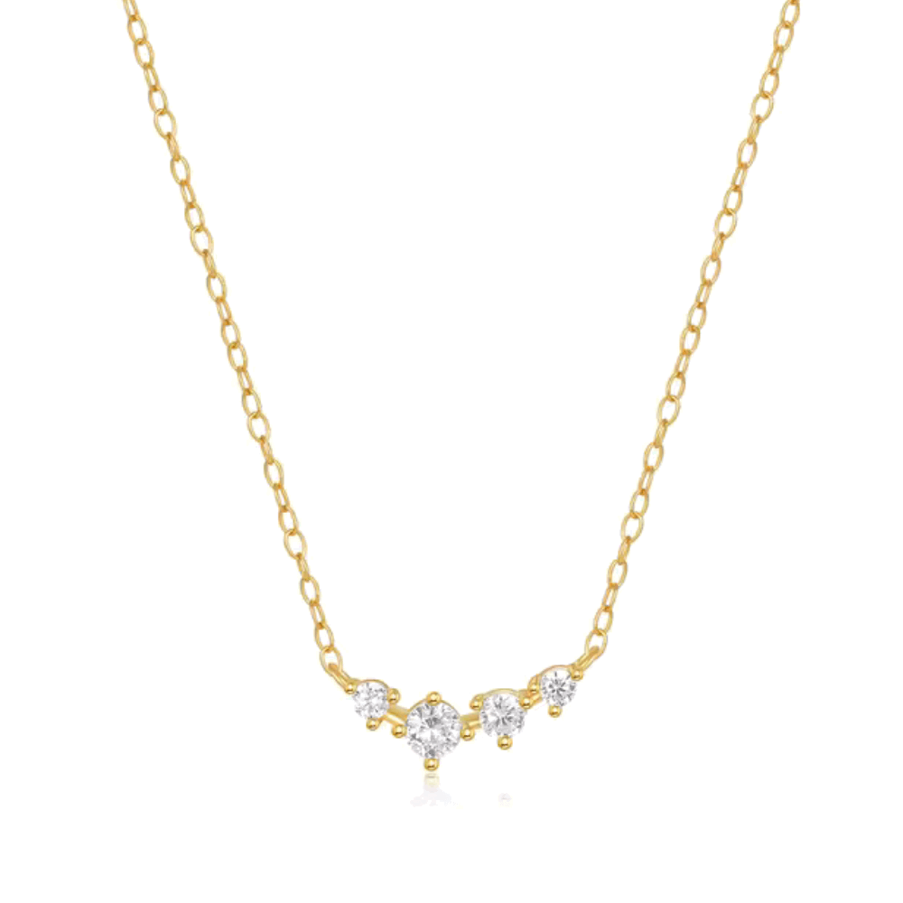 Gold-tone chain necklace with small gemstone cluster at center