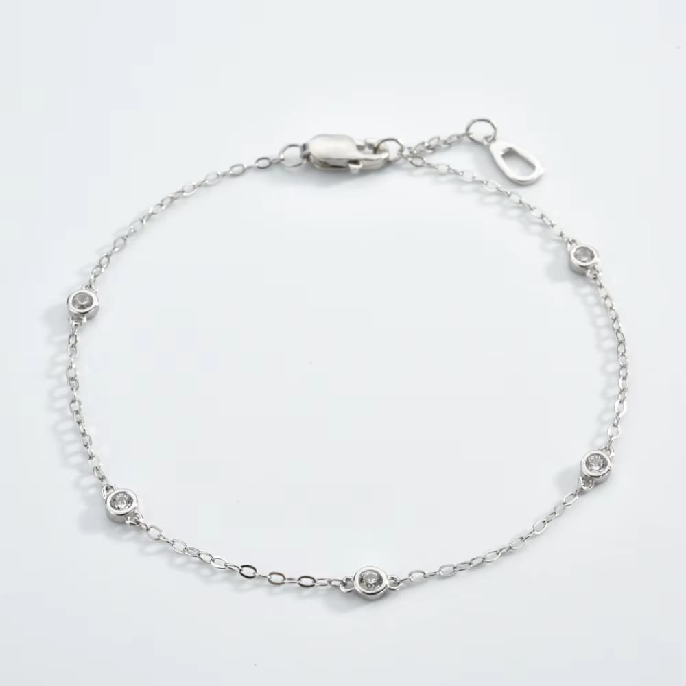 Silver cubic zirconia bezel link bracelet with round stones and lobster clasp