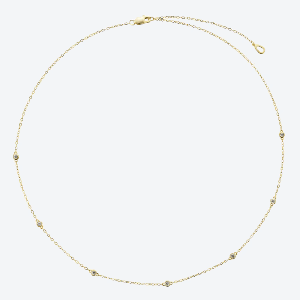 Gold-tone dainty necklace with round cubic zirconia halo bezel links and clasp