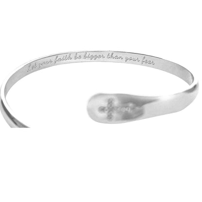 Silver cross bracelet with engraved faith message around the inner band