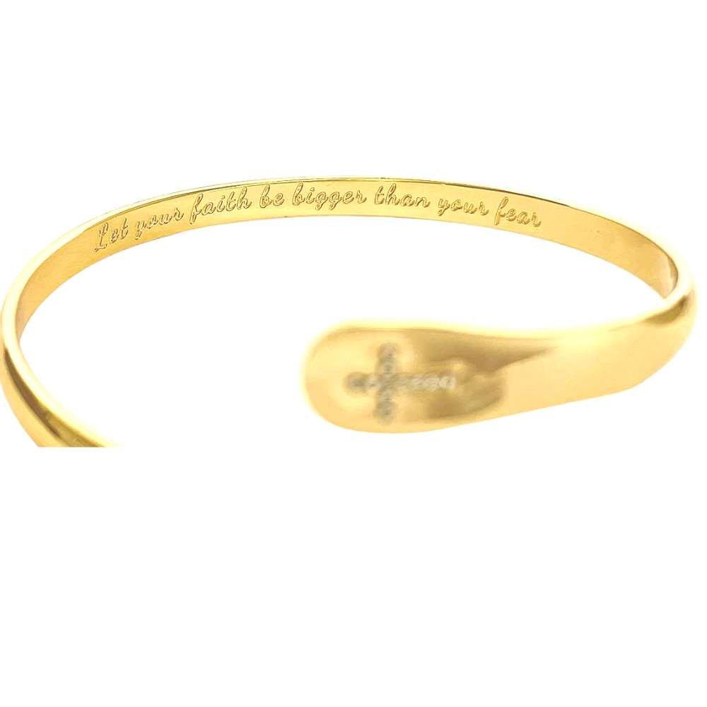 Gold cross bracelet with engraved faith message around the inner band