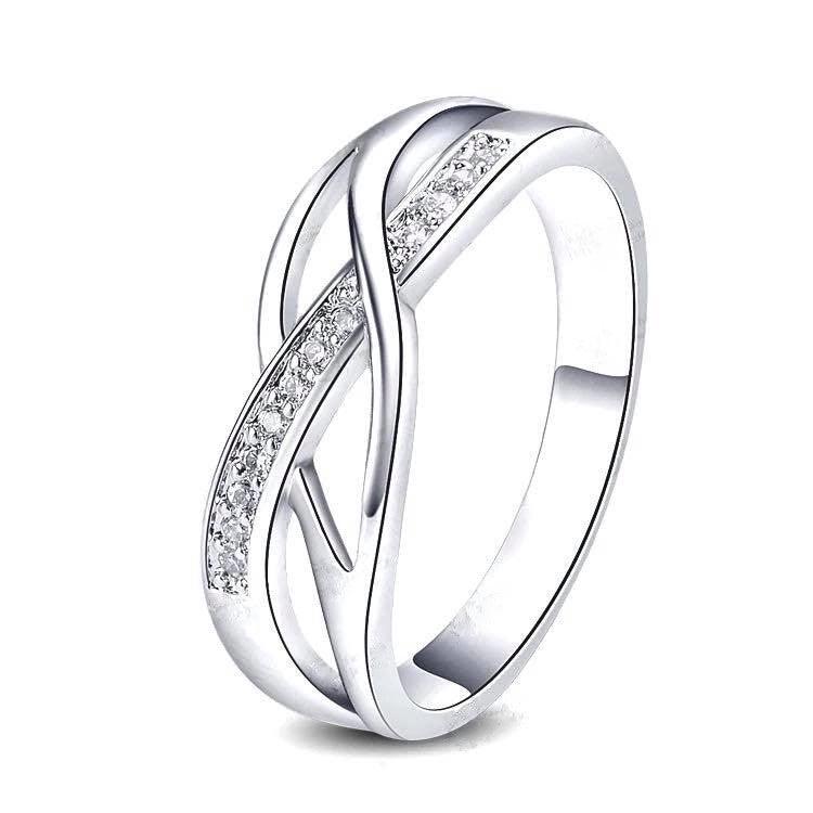 Crystal braided ring with silver-tone band and pavé stones