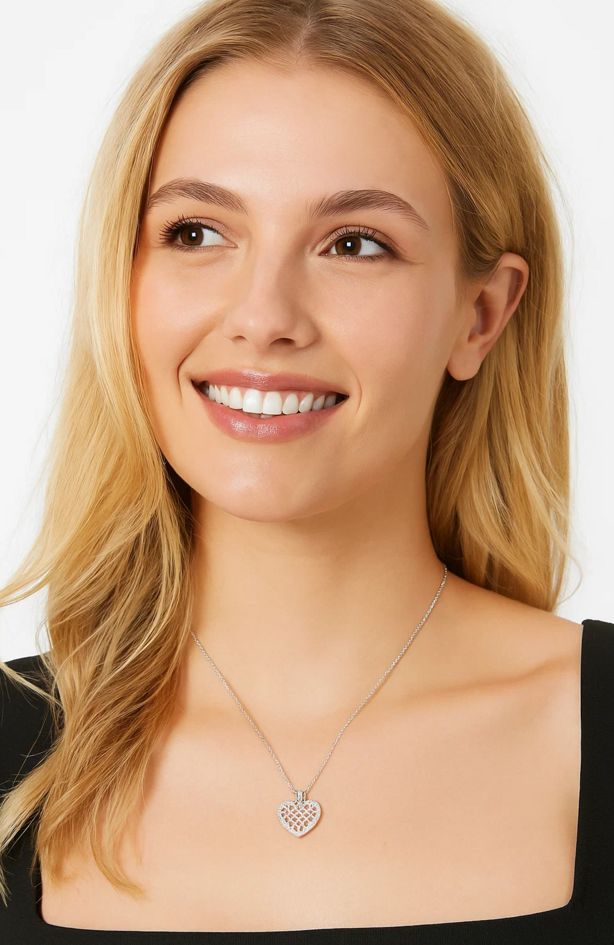 Crystal heart necklace with silver chain and pavé heart pendant on model