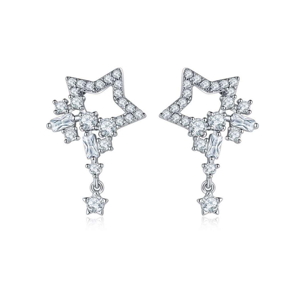 Star dangle earrings with clear crystal accents and dangling charms