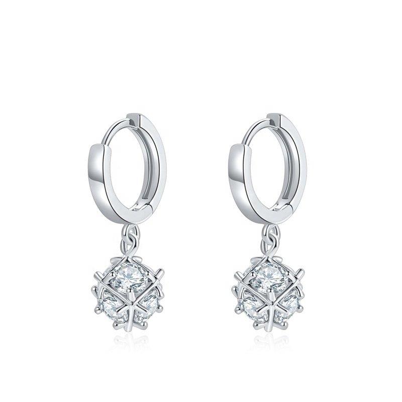 Silver hoop dangle earrings with cubic zirconia snowflake charm