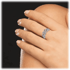 Multicolor cubic zirconia ring on finger, silver-tone band with clustered crystal stones
