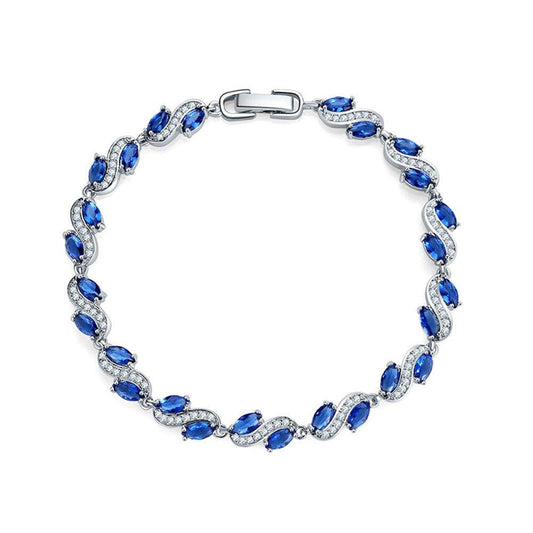 Cubic zirconia tennis bracelet with blue oval stones and silver-tone clasp