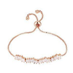 Rose gold cubic zirconia tennis bracelet with adjustable spring clasp and stone row