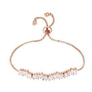 Gold tennis bracelet with cubic zirconia teardrop stones and spring clasp