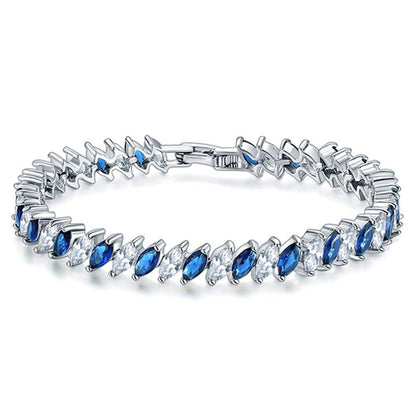 Marquise-cut blue and clear tennis bracelet with silver-toned links and hinged clasp