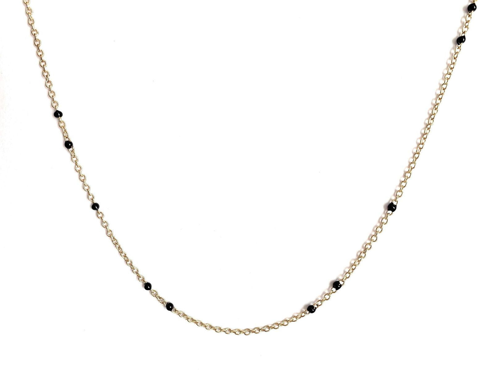 Gold-tone beaded link necklace with black onyx-style beads, close V-shape.