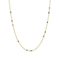 Gold link necklace with small black bead accents along the chain