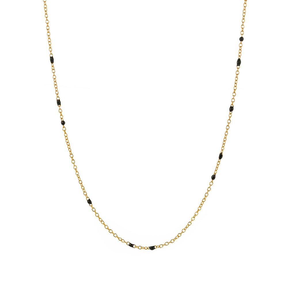 Gold link necklace with small black bead accents along the chain
